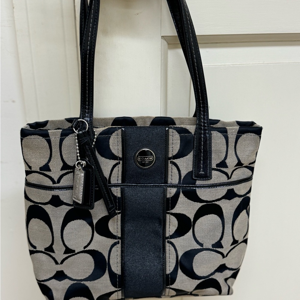 Black and Grey Coach Signature Tote. Medium size with inside compartments.